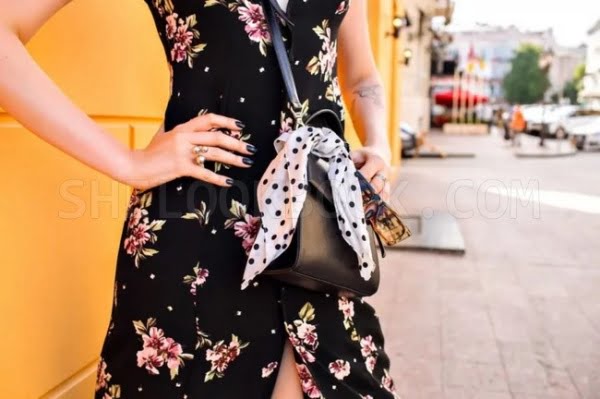 Black Dress Flower Patterns Black Leather Bag White Scarf Black Varnish Manicure 