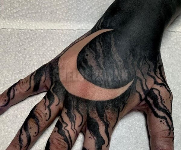 Crescent-Moon-Tattoo-On-Man-Hand-8838066-2545579