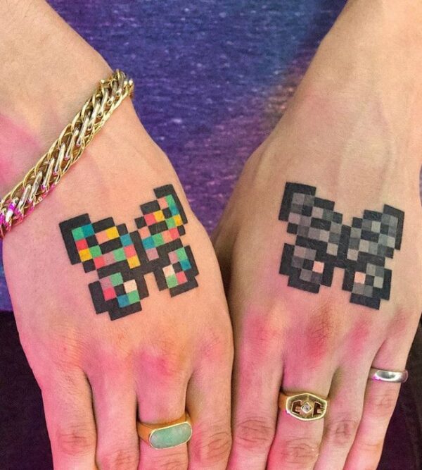 Pixelated-Butterfly-Duo-Male-Hand-Tattoo-4638338-3941937