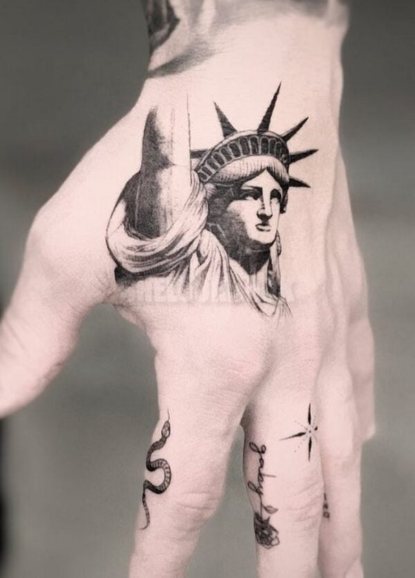 Statue-Of-Liberty-Man-Hand-Tattoo-4195599-7837856