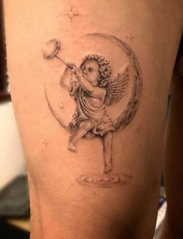 Cherub-On-Crescent-Moon-Tattoo-1933663-4542180