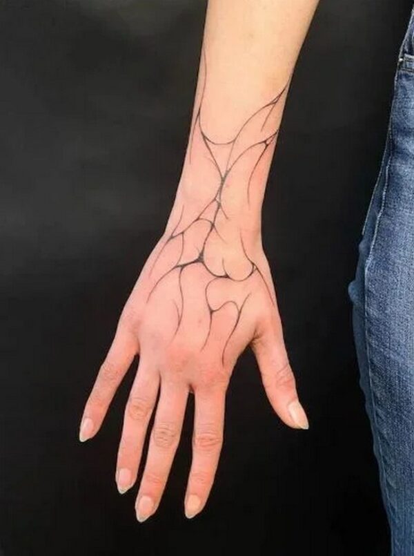 Crack Tattoo On Back Hand