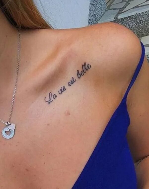 Life Is Beautiful Tattoo On The Collarbone