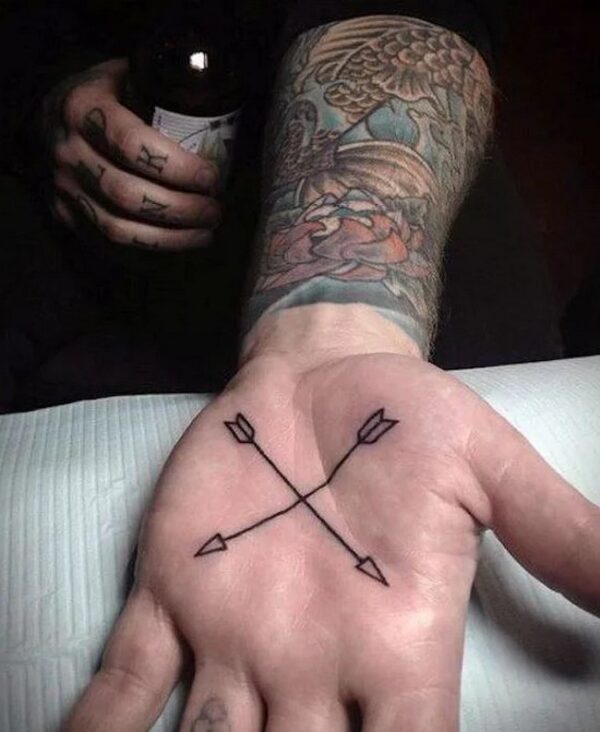 Tattoo With Two Crossed Arrows