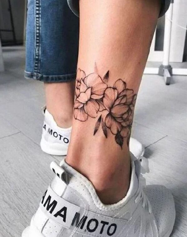 Tattooed Female Ankles And Sneakers